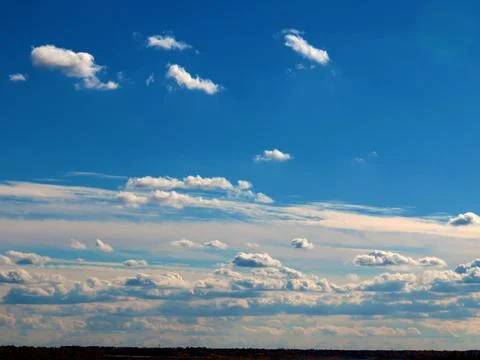 Sunny cloudy sky Stock Photos