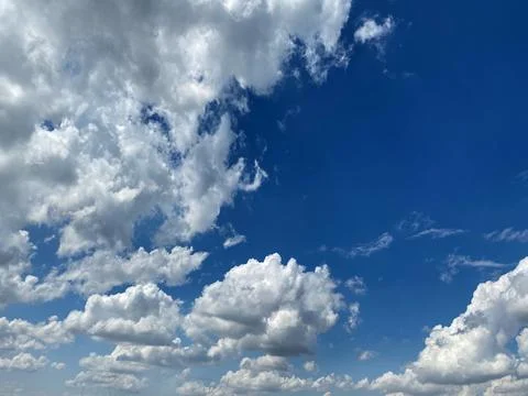 Sunny cloudy sky Stock Photos