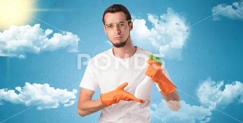 Sunny concept with housekeeper and orange gloves Stock Photos