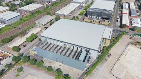 Sunny Day Aerial of Large Data Center in Industrial Park Stock Footage 337527708