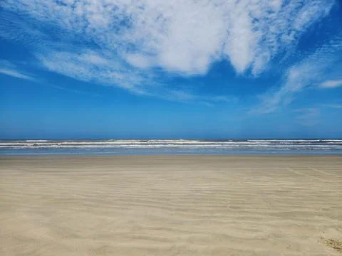 A sunny day at the beach Stock Photos
