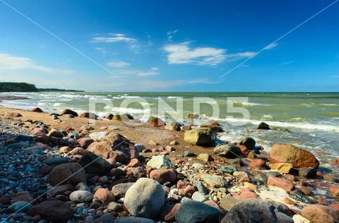 Sunny day with blue sky on the beach. Stock Photos