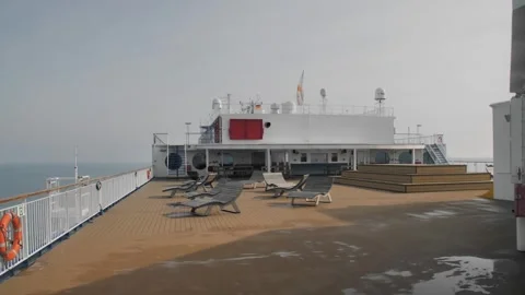 Sunny day on the deck of a large ferry cruising over calm waters Stock Footage 289697735