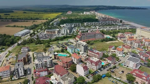 Sunny day drone shot over resort pools in Obzor, Bulgaria Vídeo Stock 344472392
