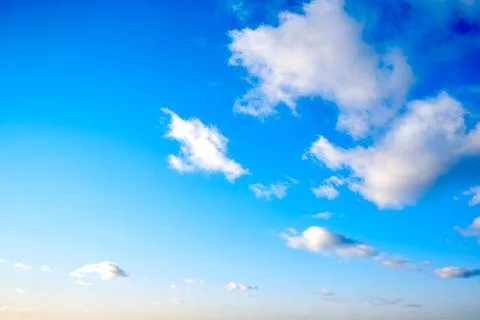 Sunny day with floating white cloud, copy space. Background in the form of a  스톡 사진