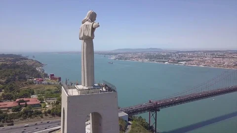 Sunny day lisbon city christ the king monument aerial panorama 4k portugal Stock Footage