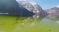 Sunny day in mountains, smooth lake surface, reflection in water, meditation 4k or 4k+ Resolution