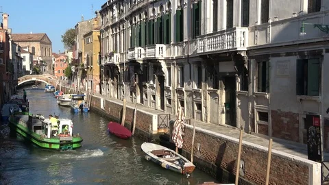 Sunny day on one of the canals of Venice. Italy Stock Footage