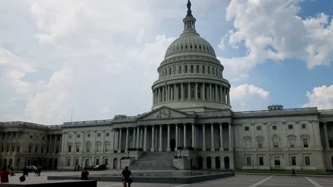 Sunny day outside US Capitol Stock Footage
