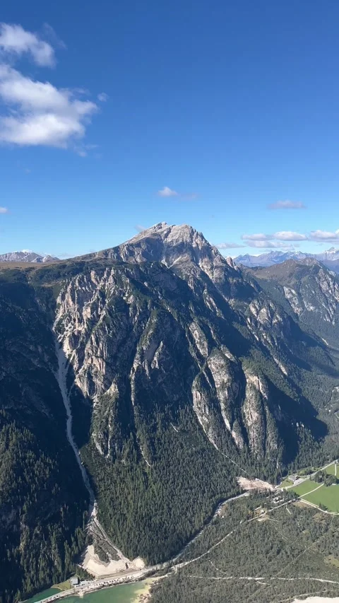Sunny Day Over the Dolomites Mountain Range – 4K Vertical Stock Footage 331075971