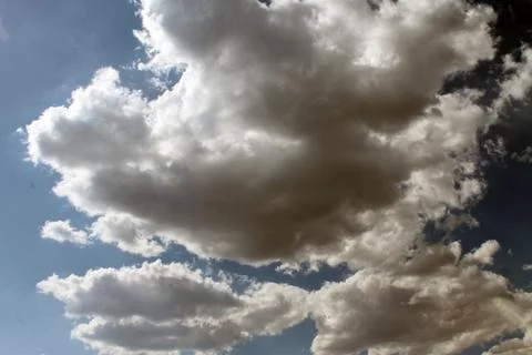 Sunny day. the sun through the clouds Stock Photos