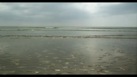 Sunny day waves rolling in 4k Video stock 297207860