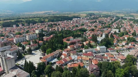 Sunny daylight over Razlog roofs Bulgaria Vídeo Stock 344059142