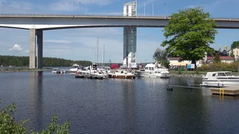 On a sunny june day at the road bridge Puumala. Finland Stock Footage