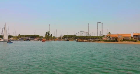 Sunny Marina View In Cap d'Agde With Luna Park Distance. Agde, France. wide shot Stock Footage 314424296