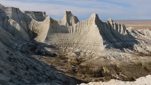 Sunny morning in the white stony chalky canyon of Kasakhstan slider 4K Stock Footage