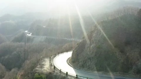 Sunny mountain road Stock Footage 179369987