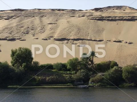 Sunny nile coast near aswan Stock Photos