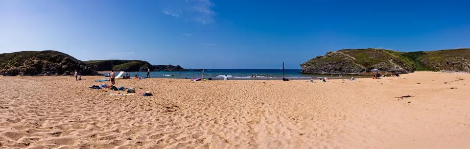 Sunny Panoramic Sandy Beach With Cliffs, Sea and People Enjoying Summer Holid Fotos Stock
