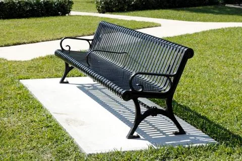 Sunny park bench Stock Photos