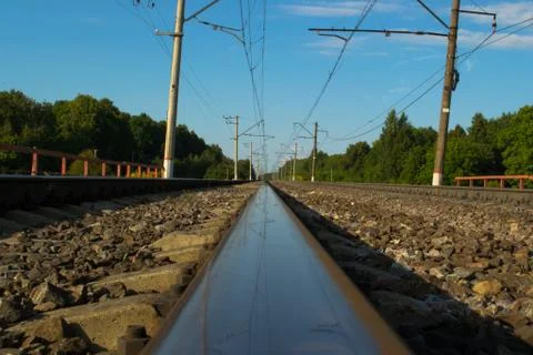 Sunny railway with reflection Stock Photos