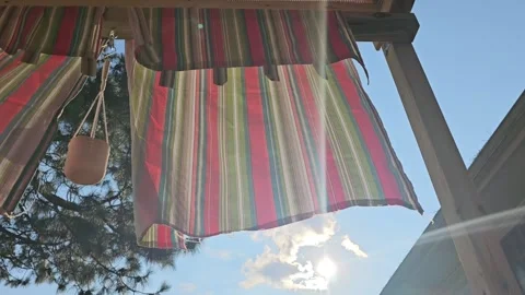 Sunny Rays Behind a Flowing Curtain Stock Footage 246090612