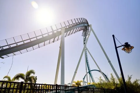 Sunny Roller Coaster Track In Theme Park Stock Photos
