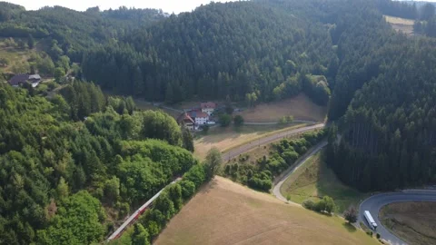 Sunny Rural Landscape with Fields, Roads and Green Hills from Above Stock Footage 340586778