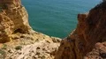 Sunny sand stone cliffs landscape at Algarve coastline Portugal 4k or 4k+ Resolution