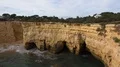 Sunny sand stone cliffs landscape at Algarve coastline Portugal 4k or 4k+ Resolution