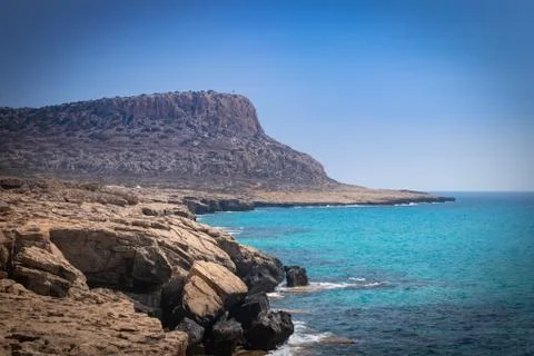 Sunny seascape with the mountain Stock Photos