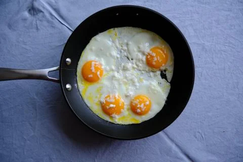 Sunny Side Up Eggs with Cheese Stock Photos