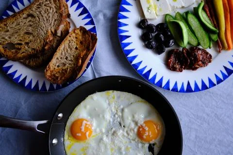 Sunny Side Up Eggs with Cheese Stock Photos