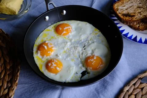 Sunny Side Up Eggs with Cheese Stock Photos