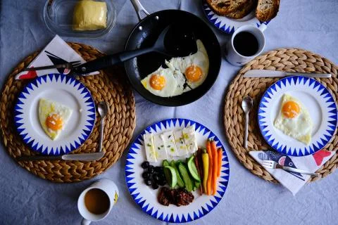 Sunny Side Up Eggs with Cheese Stock Photos