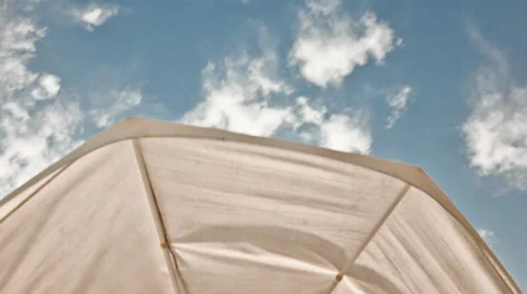 Sunny Sky view Under the Umbrella Time Lapse Stock Footage 32009111