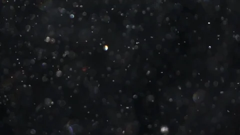 Sunny snowfall with shallow focus and sparkling colorful snowflakes Stock Footage 87871146