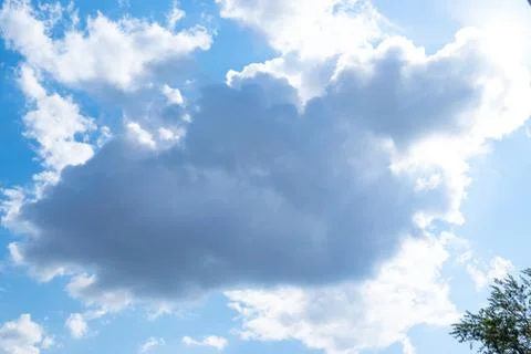 In sunny spring summer, clouds float on blue sky.  Foto stock