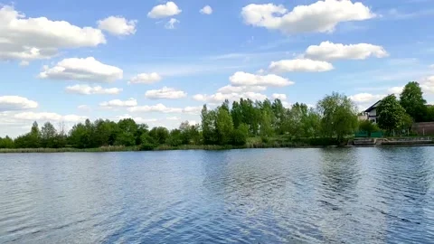 Sunny summer spring river bank Stock Footage 196147897
