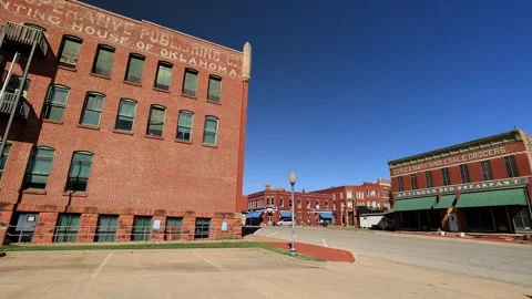 Sunny view of the State Capitol Publishing Museum in old town of Guthrie Stock Footage 163623293