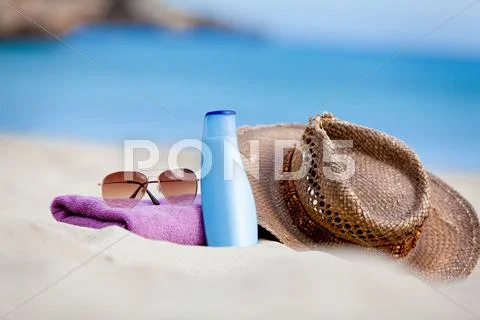 Sunprotection objects on the beach in holiday Stock Photos
