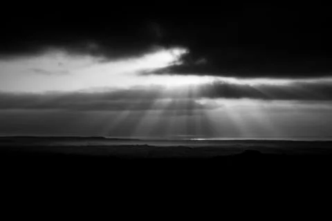 Sunray through clouds above the sea, Fuerteventura Island, Canary Islands, Spain Stock Photos