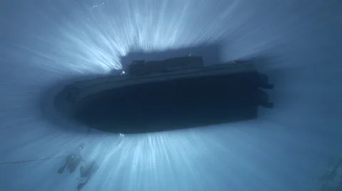 Sunrays and a Boat Silhouette Stock Footage 53305489