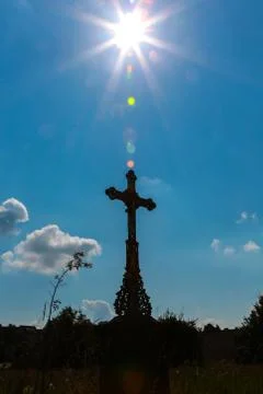 Sunrays and cucifix Foto stock