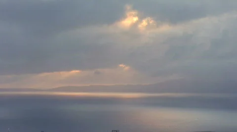 Sunrays appearing behind cloud Stock-Footage 358746