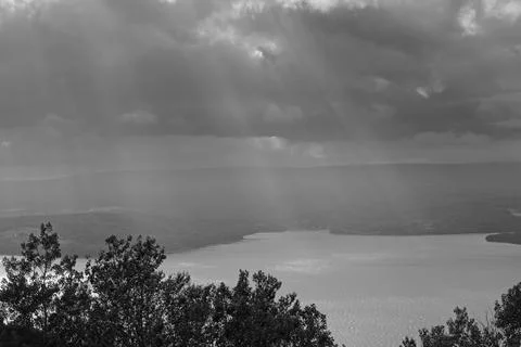 The sunrays break through the storm clouds over Cape Breton Island, Nova Sc.. Stock Photos