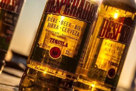 Sunrays create beautiful colors through bottles of Beer Fotos Stock