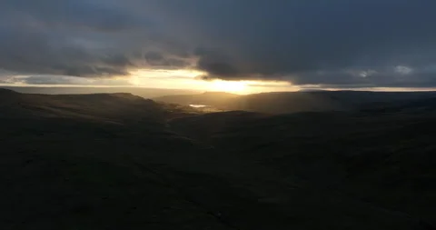 Sunrays over mountain and lake Stock Footage 276144643