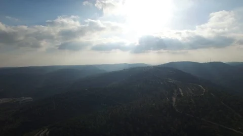 Sunrays over Sataf Forest, aerial view. Jerusalem Hills. Israel. DJI-0144-02 Stock Footage 124372828