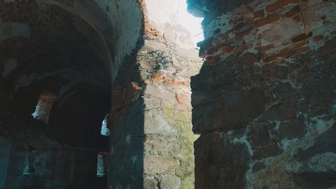 Sunrays Peaking through Hole in Old Tower Ruin | HD Stock Footage 88324145